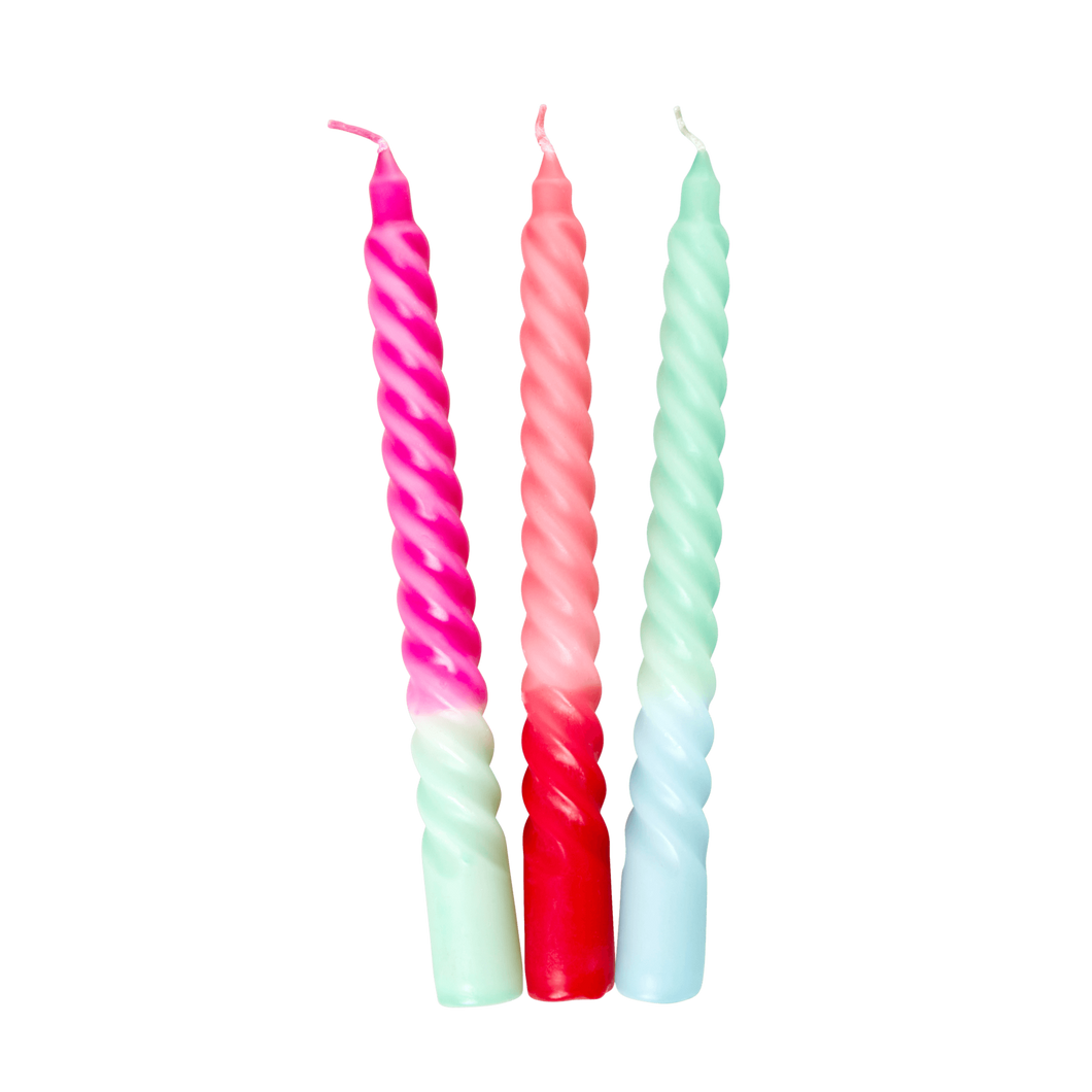 Twisted dinner candles in bright pink, mint, peach and pale blue